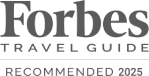 The image shows a logo for Forbes Travel Guide with the text "Recommended 2023" beneath it.