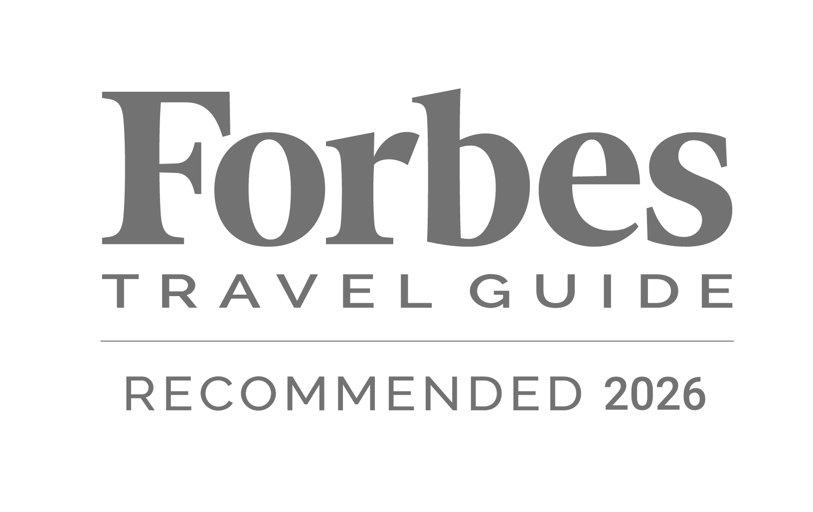 Forbes Travel Guide recommends this site for 2026, as shown in the image. logo on footer section.