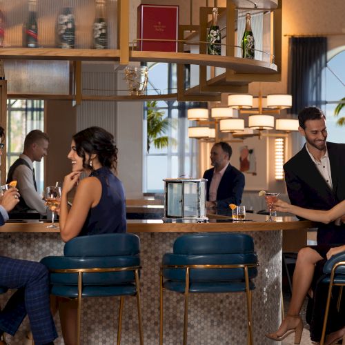 People are enjoying drinks and conversation at a stylish bar with modern decor in a casual setting.